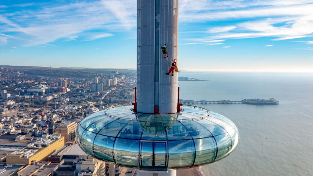 Drone shot by DAV Media of Santa climbing the Brighton i360